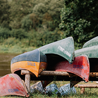 stacked canoes